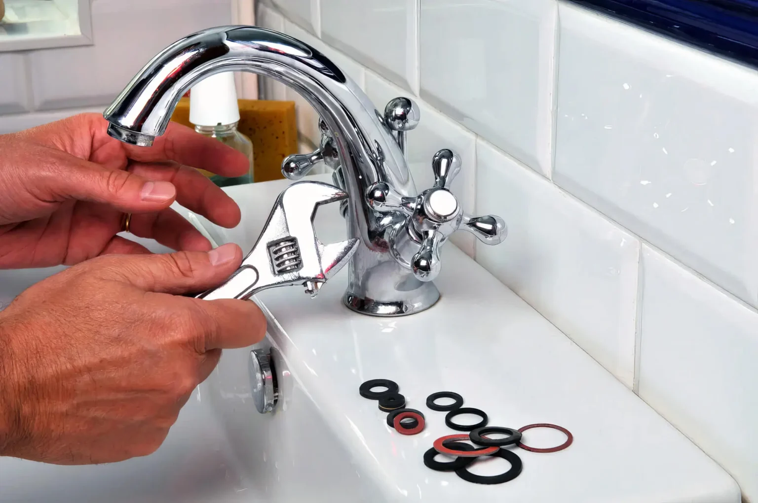 Plumber maintaining a bathroom faucet in Burbank